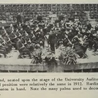 University band sitting in concert order.