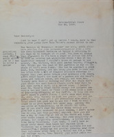 First page of typed letter on white paper and rusty discoloration.