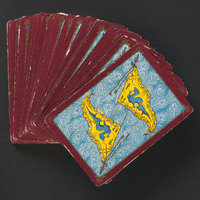 A deck of cards face down and fanned out.